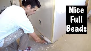 HOW TO COAT CORNER BEAD hawk and trowel [upl. by Broucek301]